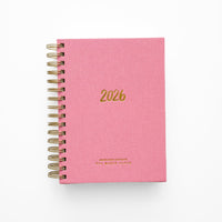 Pink prayer journal with gold spiral and 2026 on the front.